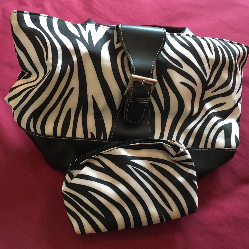 Handbag with matching makeup carrying case.